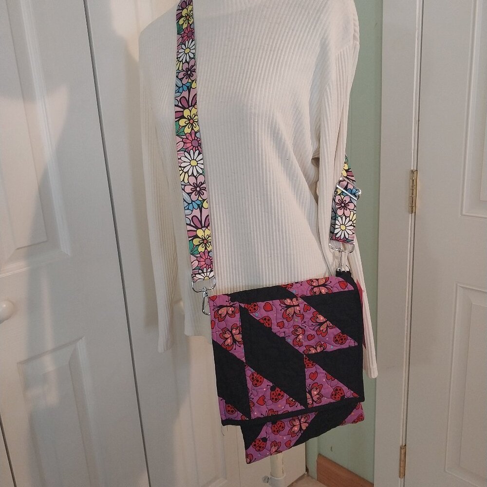 3185 Handmade Quilted Crossbody Bag with Guitar Strap. In Purple and Black.